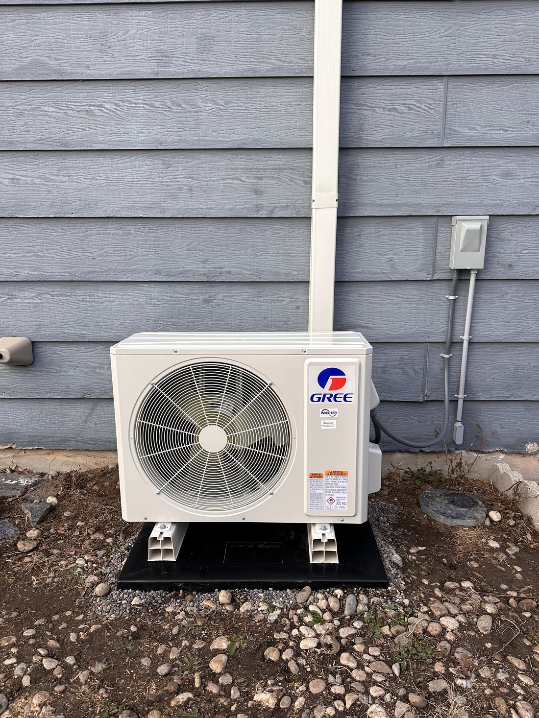 Gree Vireo mini-split outdoor unit installed by S&K beside a Middleton, Idaho home