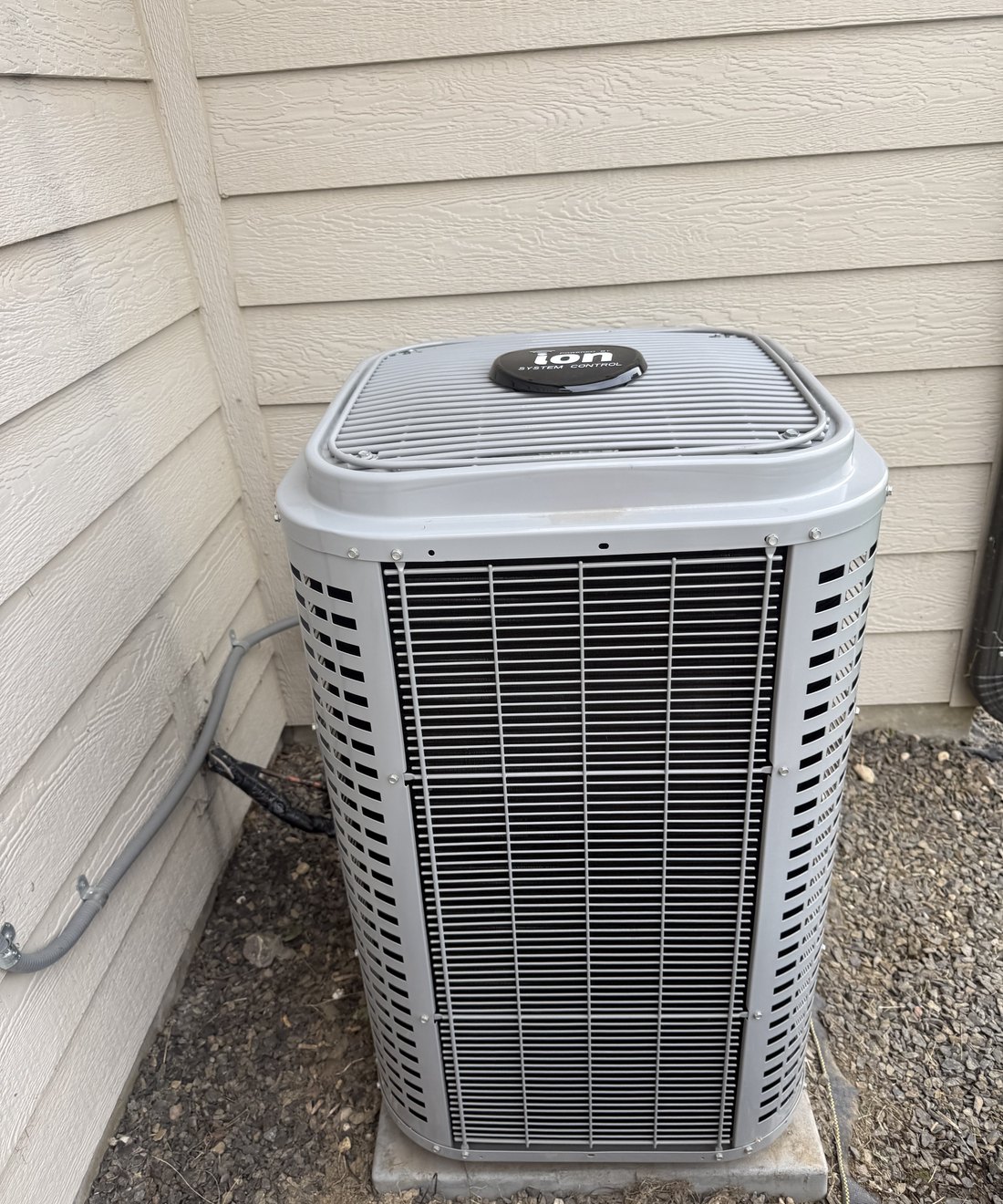 New air conditioner condenser installed by S&K beside a home in Eagle, Idaho
