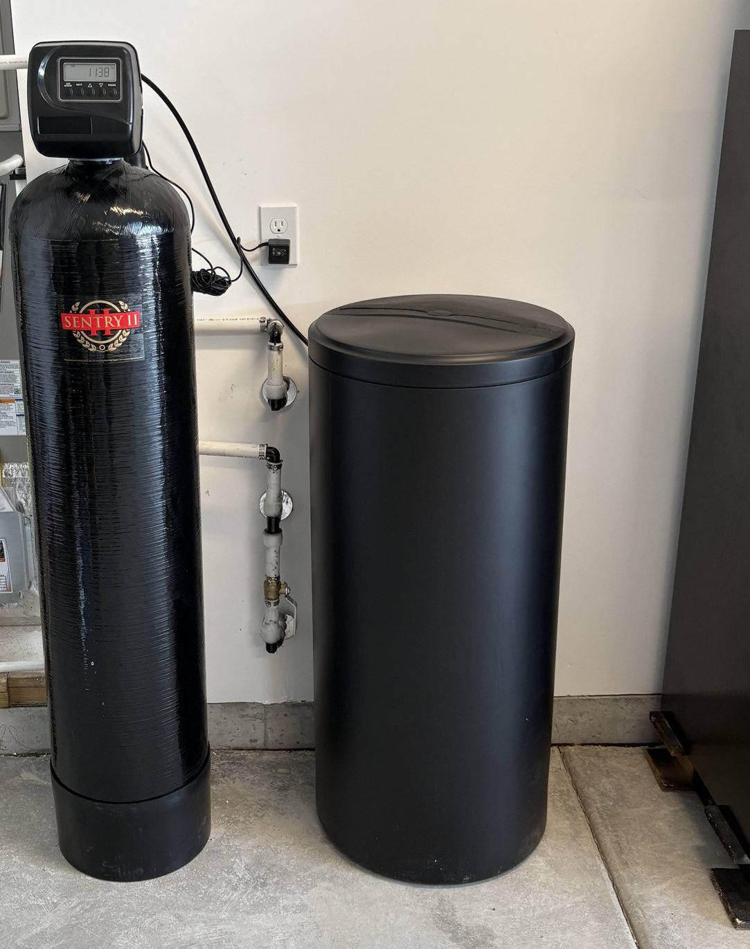 60K Sentry II water softener and brine tank installed in a Kuna garage